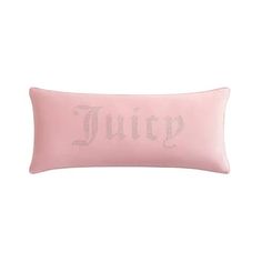 a pink pillow with the word juicy printed on it's front and back side