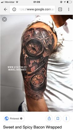 a man's arm with a clock and compass tattoo on it