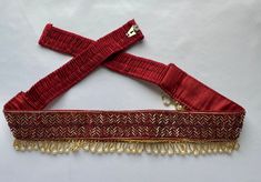 "Areya collections offers unique collection of items. Beautiful Maggam/embroidery work cloth Indian ethnic-wear waist belt (Vaddanam) for Adults and Teenage kids This fabric waist belt is a perfect match on Wedding Sarees & simple sarees or Lehanga Belt or as Vadanam /Vaddanam /Vadanalu /Vadanallu /Ottyanam Kardhani Kamarbandh For ladies Color and Size: Red Saree belt - Has 3 different size settings. Expandable. Fits waist from 27.5 to 42  inches Blue belt- Has 3 different size settings. Expandable. Fits waist from 27 to 39 inches Pink color - Has 3 different size settings. Expandable. Fits waist from 26 to 37 inches Green color - Has 3 different size settings. Expandable. Fits waist from 28 to 40 inches Width approx. 2\". Excellent accessory for women Indian wear (Saree, Half-saree,leheng Half Saree Belt Designs, Belt For Saree, Waist Belt For Lehenga, Bollywood Bridal Belt For Party And Festivals, Belt Design For Saree, Traditional Bridal Belt For Party And Festivals, Traditional Embroidered Bridal Belt For Festive, Cloth Hip Belt For Saree, Traditional Bridal Belt For Festive Party