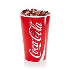 a red cup filled with coca cola and chocolate chunks on top of it's side