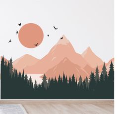 a wall mural with mountains, trees and birds in front of a sunset over a mountain range