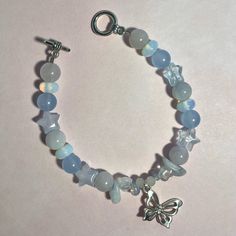 7 And A Half Inches In Length. Winter Bracelet Ideas, Cute Butterfly Bracelets, Fairycore Bracelet Ideas, Handmade Blue Charm Bracelet, Handmade Blue Crystal Bracelet, Blue Bracelet Ideas, Beaded Bracelets Aesthetic, Fairycore Bracelet, Song Bracelets