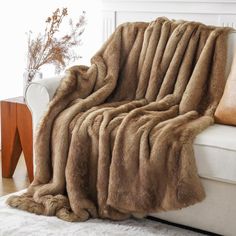 PRICES MAY VARY. Fleece,microfiber 2 BLANKETS IN 1: Our soft blanket features faux fur on one side, and plush velvet on the other side, captures the authentic look and plush feel of genuine fur. Available in 50"x60" and 60"x80" options. CLASSY & ELEGANT: Crafted with long hair faux fur on the top side and solid mink on the backside, our tipped fur blanket will take your home decor to a whole new level. PERFECT for SOLO USE or SHARING: Our soft throw blanket measures 50"x60" and 60"x80". This com Gold Rabbit, Rainbow Plush, Faux Fur Throw Blanket, Luxury Throws, Faux Fur Blanket, Fur Throw Blanket, Plush Sofa, Fur Blanket, Fluffy Blankets