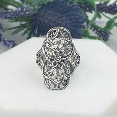 Handmade 925 Sterling Silver Artisan Crafted Filigree Ring  Material: 925 Solid Sterling Silver, 925 Stamped Ring Face Length: 1 inch  Width: 0.55 inches Finishing: Oxidized and Polished Comes with a free gift pouch & box Free Domestic Shipping Bohemian Rings With Intricate Design For Gift, Bohemian Rings With Intricate Design As Gift, Silver Filigree Open Ring, Sterling Silver Filigree Ring With Oxidized Finish For Wedding, Ornate Sterling Silver Filigree Ring, Heirloom Rings With Oxidized Finish As Gift, Antique Silver Nickel-free Rings, Antique Silver Open Ring Jewelry As Gift, Antique Silver Open Ring Jewelry Gift