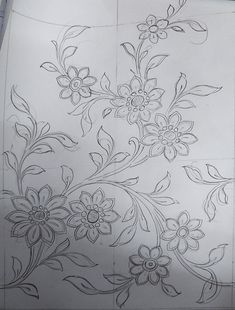 a drawing of some flowers on a piece of paper with lines going through the middle