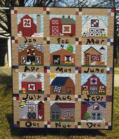 a quilt made to look like farmyards and their names are on display in the yard