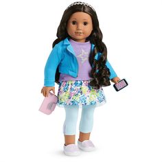 a doll with long hair wearing a blue jacket and flowered skirt holding a pink purse