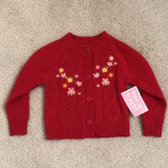 Brand New Perfect Condition Size 12 Months Has Cute Embroidered Flowers & 4 Buttons On The Front From A Smoke-Free Home! Red Sweater For Fall Playtime, Cute Red Spring Sweater, Cute Red Spring Cardigan, Playful Red Cotton Sweater, Cheap Red Button-up Sweater, Red Button-up Cardigan With Button Closure, Red V-neck Sweater With Button Closure, Baby Girl Cardigans, Blue Knit Sweater