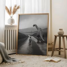 a black and white photo of a person standing in front of a dinosaur on the road