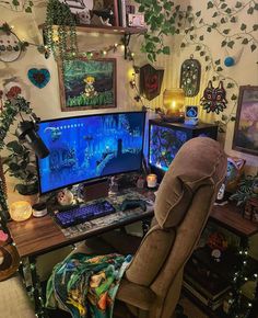 a chair sitting in front of a computer desk with two monitors on it and plants growing up the wall