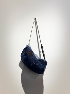 This crossbody bag are made form vintage jeans, we turn the jeans pocket detail into the bag details. Measurements (inch): Height : 6" Width : 15" Handle height: 25-46" Product Origin: All of our products are imported from the U.S. and are laundered / dry cleaned prior to redesign. Please note that we are using a combination of vintage garments to create our products. Any flaws will be noted in the condition of the product shown above. Jean Pocket Detail, Jeans Pocket, Jean Vintage, Bag Details, Jean Pockets, Denim Patches, Pocket Detail, Vintage Jeans, Vintage Denim