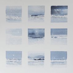 nine blue and white images are arranged on a wall in front of an ocean view