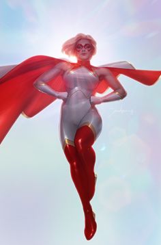 a woman dressed as a super hero flying through the air with a red cape around her neck