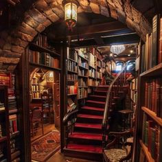 the stairs are lined with books in this library