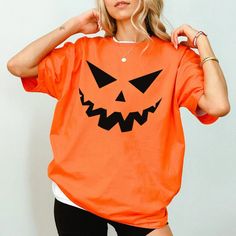 Pumpkin Face Unisex T Shirt, Stay Spooky T Shirt, Halloween T Shirt, Pumpkin T Shirt, Spooky Face T Shirt, Horror T Shirt, Halloween Night T Shirt, Party T Shirt. Funny Orange Short Sleeve T-shirt, Horror Themed Short Sleeve T-shirt For Fall, Fun Short Sleeve T-shirt For Costume Party, Fun Halloween Short Sleeve Shirt, Funny Orange Crew Neck Top, Halloween Horror Short Sleeve T-shirt, Horror Style Short Sleeve T-shirt For Fall, Spooky Short Sleeve Tops For Costume Party, Spooky Orange Crew Neck Top