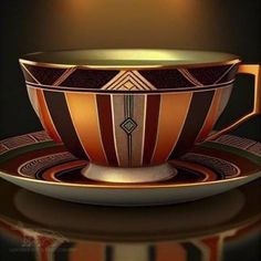 a coffee cup and saucer sitting on top of a black table with gold trim