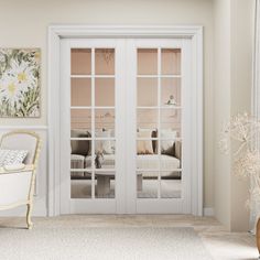 a living room filled with white furniture and lots of glass doors to the bedroom area