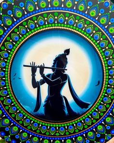 a decorative plate with an image of a woman holding a flute in front of a full moon