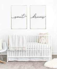 two prints on the wall above a crib in a white room with a rocking chair