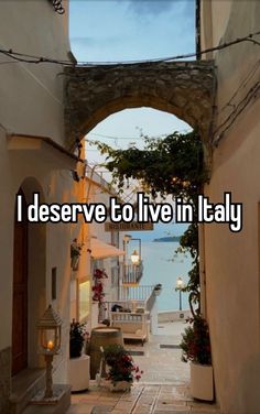 an alley way with the words i deserves to live in italy