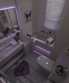 a bathroom with a purple rug on the floor