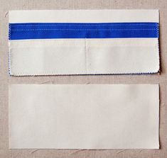 two pieces of white and blue fabric next to each other