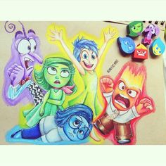 a drawing of cartoon characters on a piece of paper with colored crayons around them