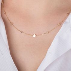 Shine bright with our Star Chain, featuring a series of laser-cut beads and delicate star charms. Crafted from 14k solid gold, this enchanting piece adds a celestial touch to your style, perfect for layering or wearing on its own for a subtle sparkle. This piece is crafted with real 14k solid gold(not plated, not vermeil, not gold filled) You don't need to worry about water, perfume or conditioner contact since real gold doesn't tarnish. You can enjoy your fine piece for decades to come. Delicate 14k Gold Star Necklace, Dainty Star-shaped Gold Necklace, Adjustable Star-shaped Necklace With Delicate Chain, Dainty 14k Gold-filled Star Necklace, Elegant 14k Gold-filled Necklace With Star Charm, Star Chain, August Birthstone Jewelry, July Birthstone Jewelry, Men's Jewelry Rings