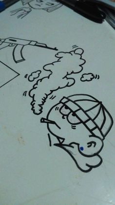 a drawing of a person with a hat on it's head is drawn on a piece of paper