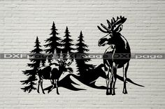 an image of a moose and trees on a brick wall