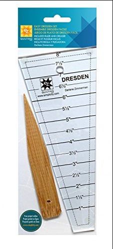 a wooden ruler with the words dreiden written on it's front side