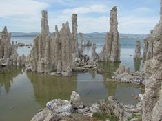 the monolithe formations are growing out of the water