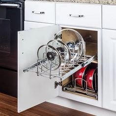 an open dishwasher drawer in a kitchen