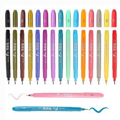 many different colored pens with writing on them