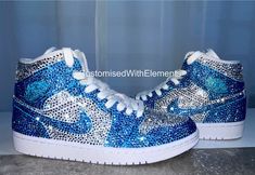 Stunning Nike Jordan 1 mids.Hand painted and customised in individually hand placed clear and baby blue precosia crystals. The gorgeous trainers catch the light at every angle giving of colours of fire and ice through the crystals clarity.These really are showstopper kicks! These have been such a joy to customised and are also available in other colours you can find these under the variations part of this listing. These are authentic Jordan1 trainers purchased from the Nikey website(originally t Custom Jordan Shoes, Custom Jordan, Jordan 1 Mids, Cute Casual Shoes, Casual Shoes Women Sneakers, Bedazzled Shoes, Nike Shoes Women Fashion, Pretty Sneakers, Nike Jordan 1