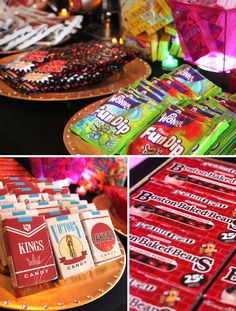 candy bars are displayed on plates and in front of other candies, with lights behind them