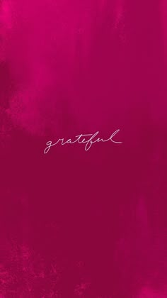 a pink background with the word grateful written in cursive writing on top of it