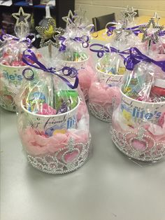 small baskets filled with candy and candies on a table