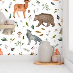 an animal themed wallpaper with bears, deers and other wild animals on it