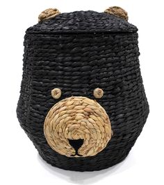 a black basket with a bear face on it