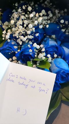 a bouquet of blue roses and baby's breath written on a note