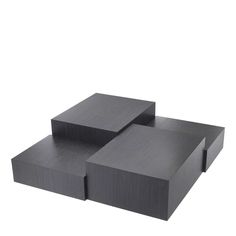 three black square tables sitting on top of each other