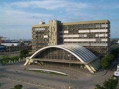 an aerial view of a large building in the city