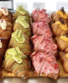 there are many different types of pastries on display