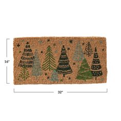 a door mat with christmas trees on it and measurements for each piece in the front