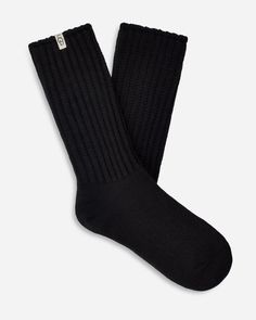 Made from a soft rib knit and crafted with Responsible Cotton, the Tyla Slouchy Crew sock is designed for a slouchier fit. | Slouchy Cotton sock. 97% Cotton/2% Recycled Polyester/1% Elastane. Made from Responsible Cotton. 11 inch height. Soft twill tape with The UGG® Logo on top cuff. Fits shoe size: 5-10. Imported. | UGG® Women's Tyla Slouchy Crew Sock Cotton Blend/Recycled Materials Socks in Tar Ugg Socks, Crew Sock, High Leg Boots, Cotton Socks, Crew Sweatshirts, Womens Uggs, Twill Tape, Socks Women, How To Take Photos