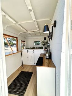 the kitchen is clean and ready to be used as a living room or dining area