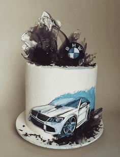 a bmw cake with an artistic design on it