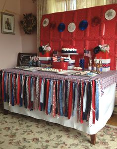 the table is covered with red, white and blue decorations