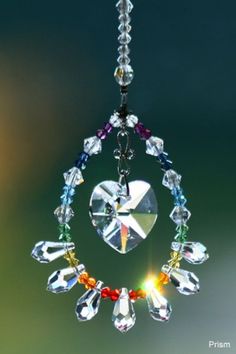 a crystal sun catcher hanging from a string